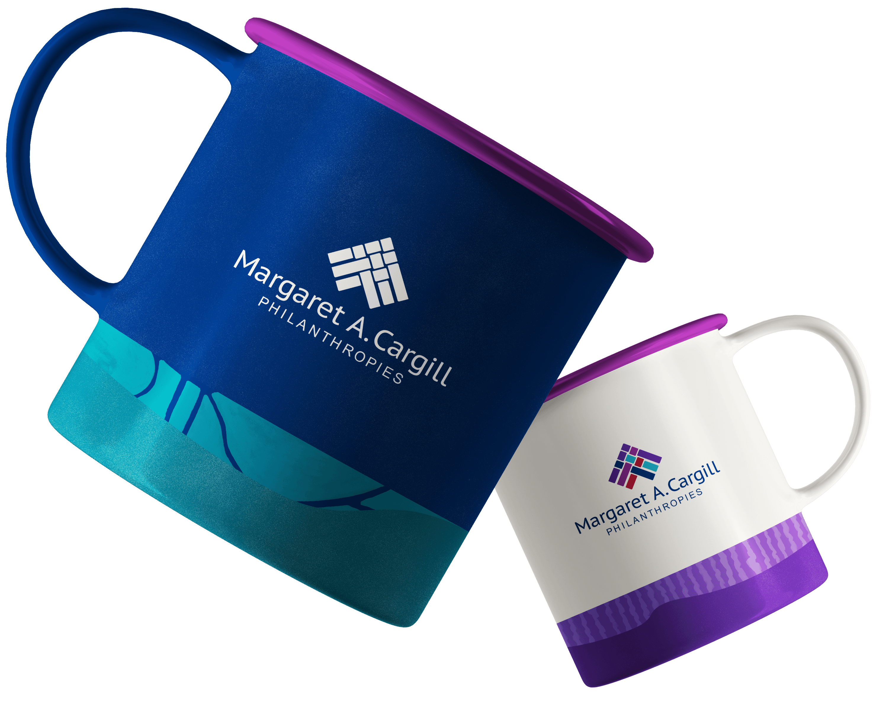 Two ceramic mugs with Margaret A. Cargill Philanthropies logos; one mug is dark blue with teal and purple accents, and the other is white with purple and teal details.